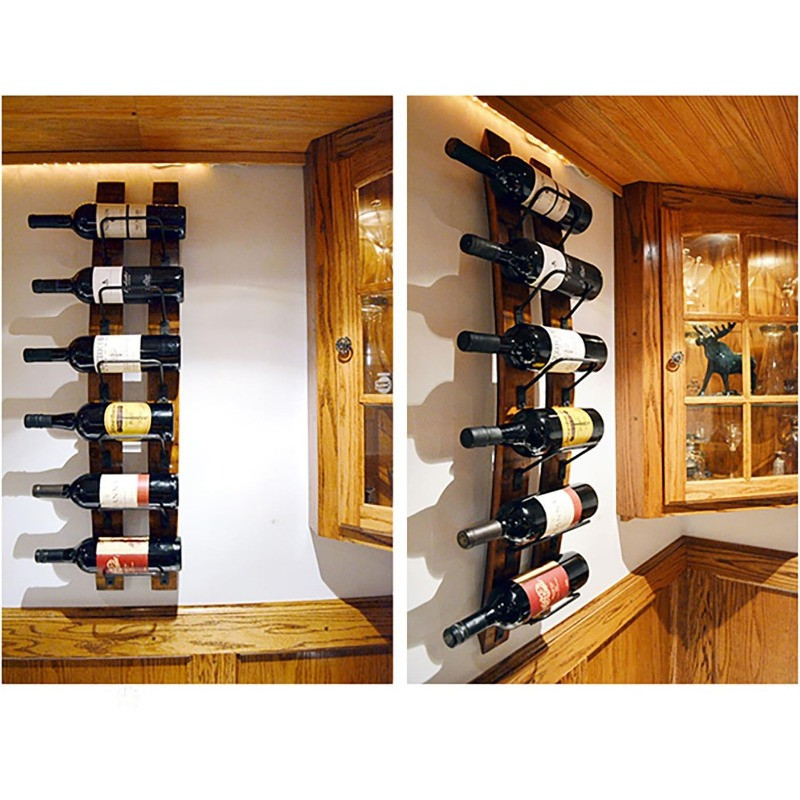 Two panels of wall-mounted wine racks with bottles in a kitchen-like setting